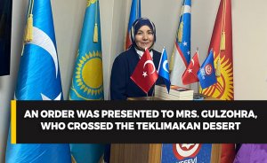 An order was presented to Mrs. Gulzohra, who crossed the Teklimakan desert