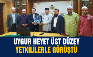 Uygur heyet Üst düzey yetkililerle görüştü