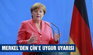 Merkel’den Çin’e Uygur Uyarısı