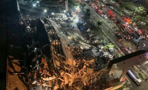 ÇİN VİRÜSÜ İLE KARANTİNAYA ALINAN OTEL BİNASI ÇÖKTÜ. 10 ÖLÜ,  23 KAYIP 48 YARALI.