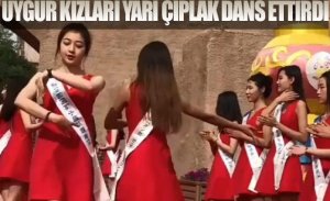 UYGUR KIZLARI YARI ÇIPLAK DANS ETTİRDİ
